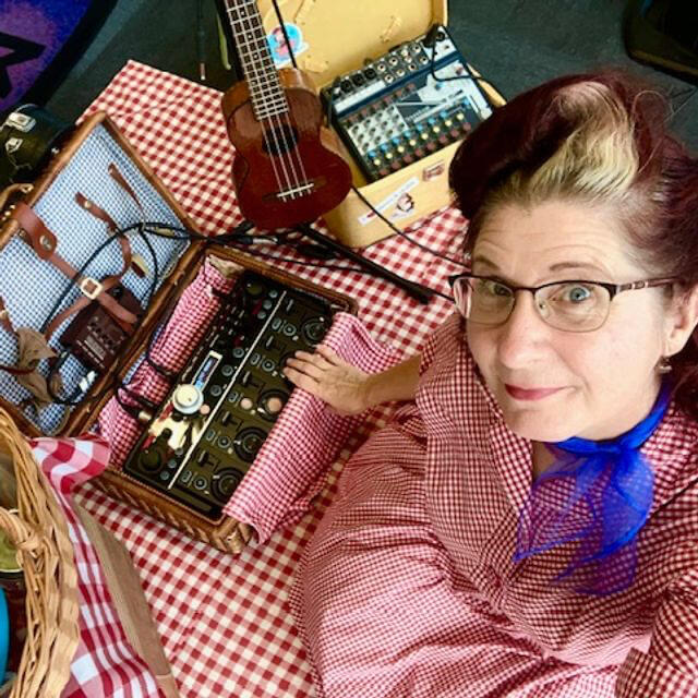 Beth Portman performing at a school